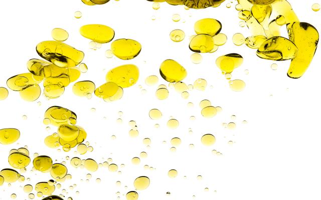 Oliedruppels in water