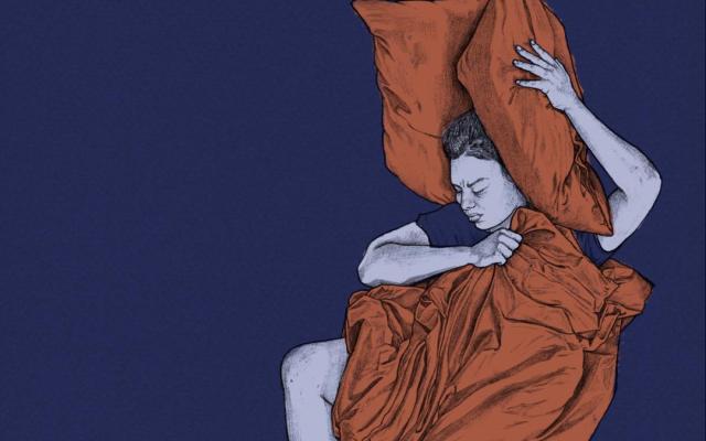 Iemand die in bed ligt