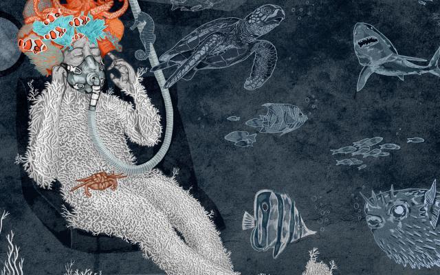 Iemand die onder water een zuurstofmasker draagt