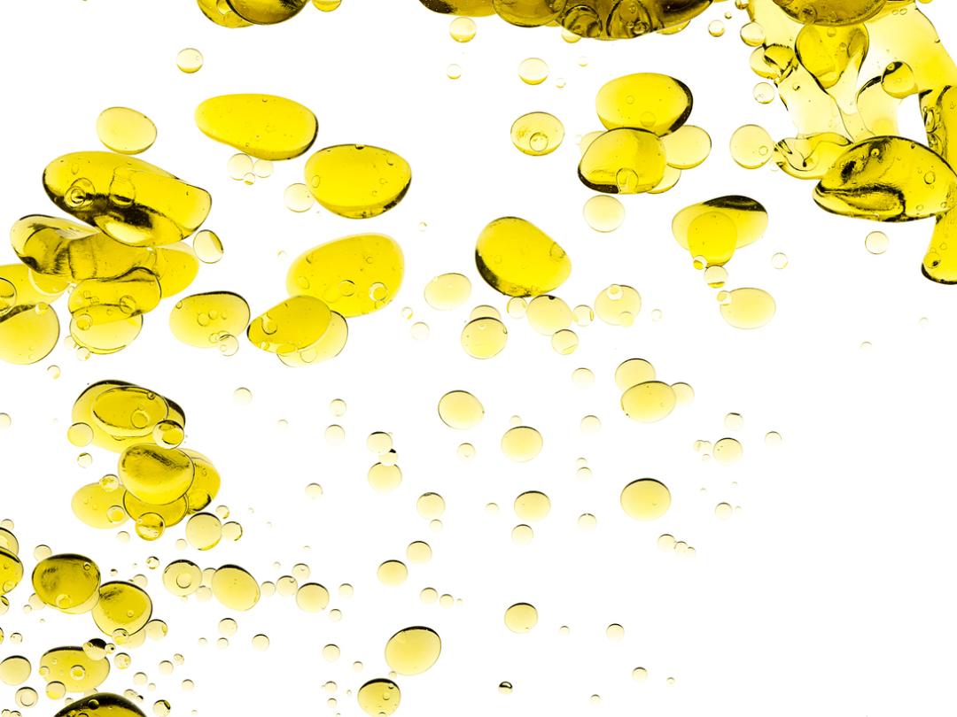 Oliedruppels in water