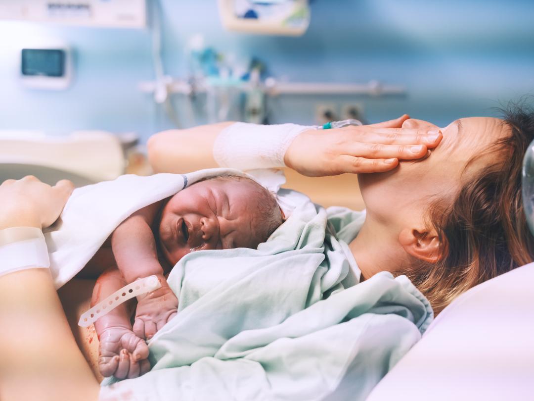 Moeder met pasgeboren baby in OK