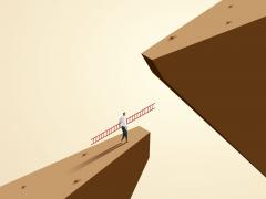 Illustratie van een figuur met een ladder aan de rand van een klif.