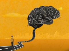 Beeld: Cemile Bingol/Istock.com Illustratie van een weg die omhoog leidt naar een brein